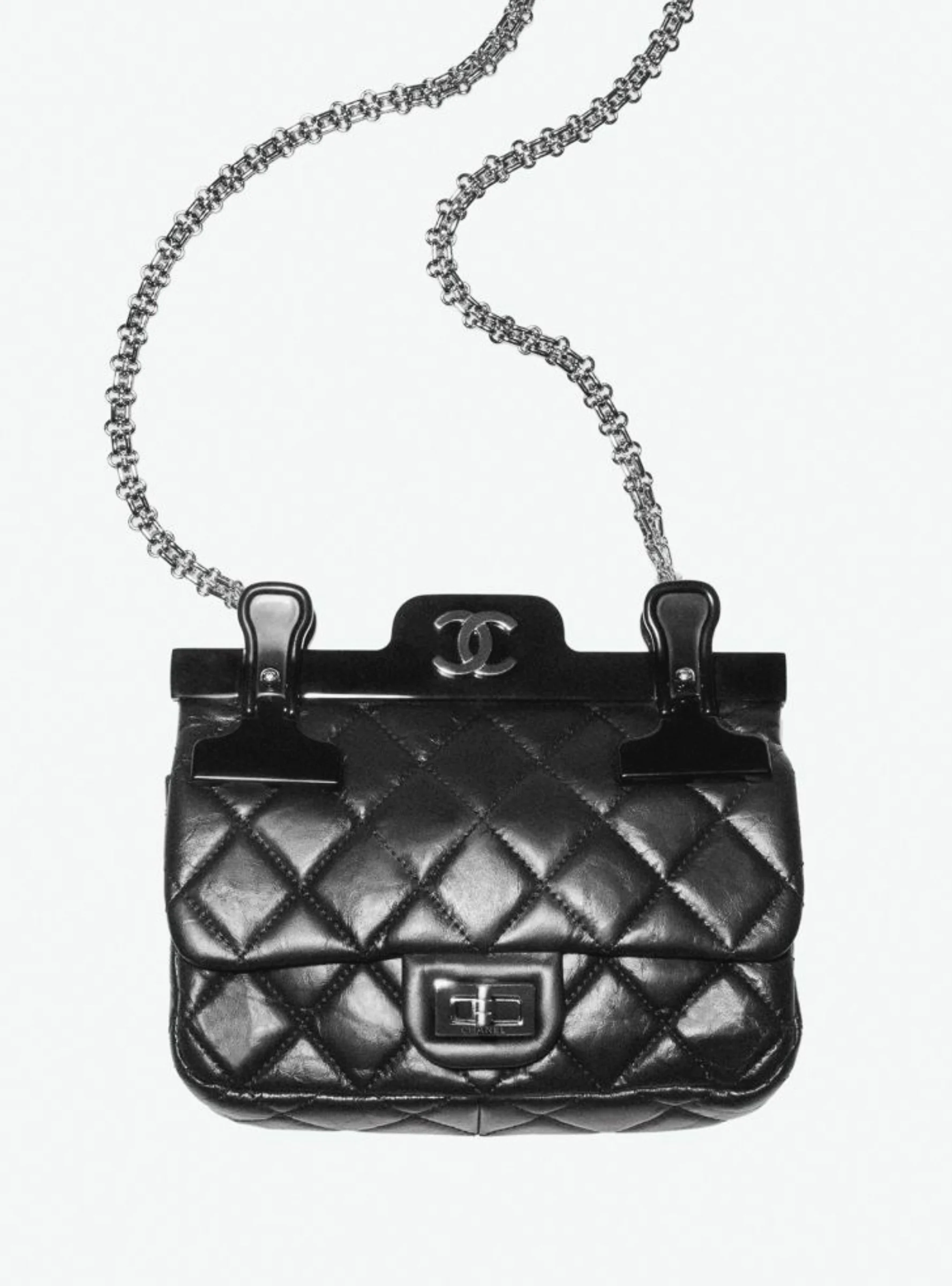 Interview, 2016: a black quilted Chanel bag on a chain