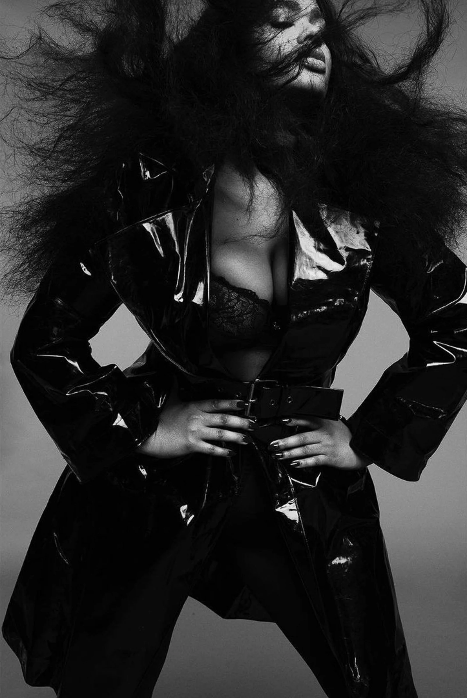 V Magazine, 2021: a model in a black patent coat